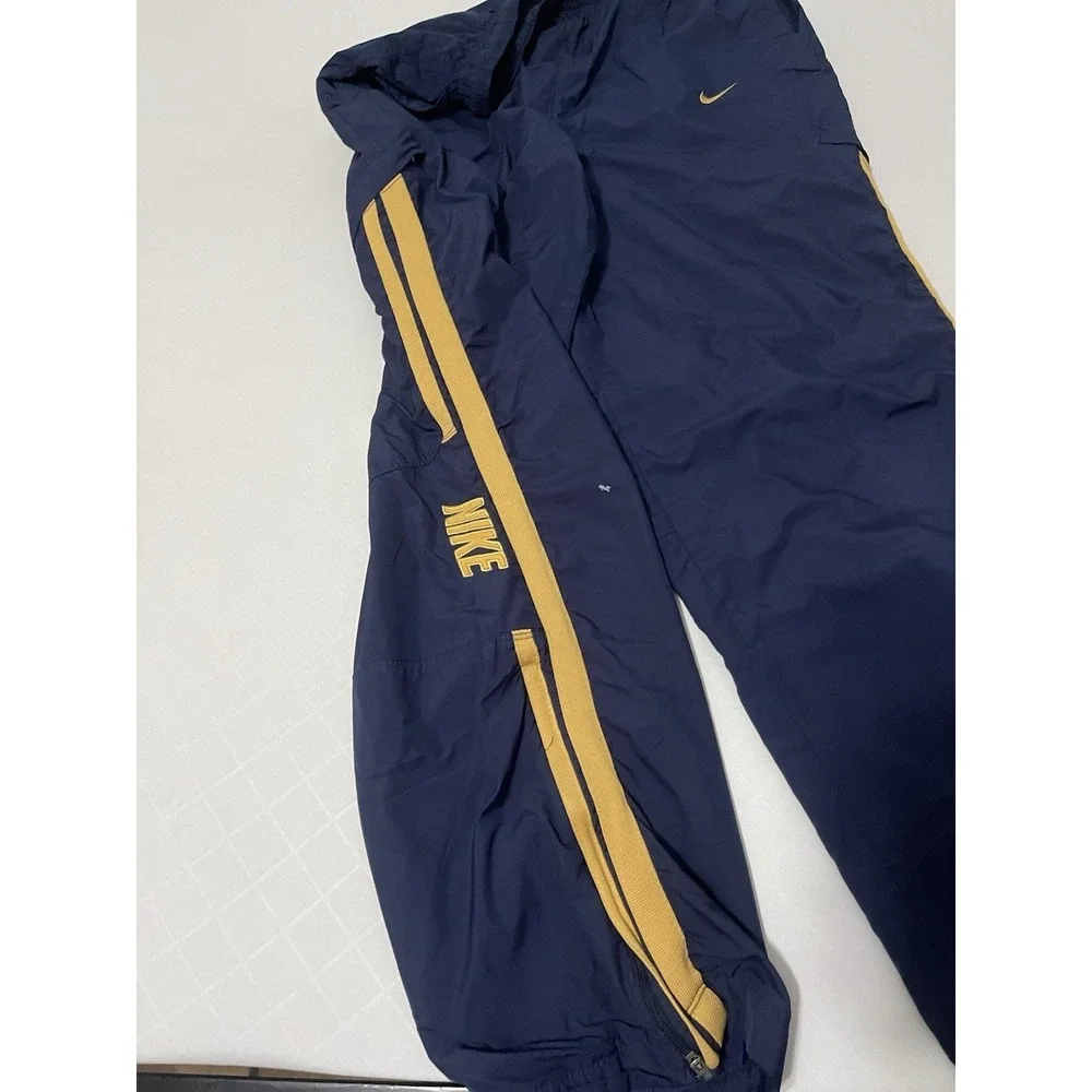 VINTAGE Nike Men Activewear Track‎ Pants S Blue Gold Swoosh Pockets Drawstring